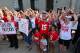 COLUMBUS, OH - AUGUST 6: Supporters of Ohio State head football coach Urban Meyer sing Carmen Ohio at a rally at Ohio State University on August 6, 2018 in Columbus, Ohio. Meyer is on paid administrative leave after a reports alleging he knew of a 2015 a