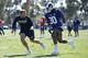 IRVINE, CA - JULY 30: Head Coach Sean McVay of the Los Angeles Rams runs through a drill with Todd Gurley #30 during Training Camp at Crawford Field on July 30, 2017 in Irvine, California. (Photo by Josh Lefkowitz/Getty Images)
