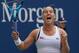 Dominika Cibulkova of Slovakia celebrates her victory over Angelique Kerber of Germany during their 2018 US Open women's round 3 match on September 1, 2018 in New York. (Photo by kena betancur / AFP) (Photo credit should read KENA BETANCUR/AFP/Gett