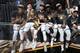CLEVELAND, OH - JUNE 8: Andre Iguodala #9, Klay Thompson #11, Stephen Curry #30, Draymond Green #23, and Kevin Durant #35 of the Golden State Warriors pose with the Larry O'Brien Championship Trophy after Game Four of the 2018 NBA Finals against the Cleve