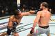 DALLAS, TX - SEPTEMBER 08: (L-R) John Dodson punches Jimmie Rivera in their bantamweight fight during the UFC 228 event at American Airlines Center on September 8, 2018 in Dallas, Texas. (Photo by Josh Hedges/Zuffa LLC/Zuffa LLC via Getty Images)