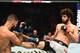 DALLAS, TX - SEPTEMBER 08: (R-L) Zabit Magomedsharipov of Russia kicks Brandon Davis in their featherweight fight during the UFC 228 event at American Airlines Center on September 8, 2018 in Dallas, Texas. (Photo by Josh Hedges/Zuffa LLC/Zuffa LLC via Ge