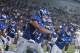 LAWRENCE, KS - SEPTEMBER 1: Wide receiver Kerr Johnson Jr. #14 of the Kansas Jayhawks celebrates a touchdown against Nicholls State Colonels at Memorial Stadium on September 1, 2018 in Lawrence, Kansas. (Photo by Ed Zurga/Getty Images)