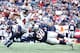 FOXBOROUGH, MA - SEPTEMBER 9: Malcom Brown #90 of the New England Patriots tackles Deshaun Watson #4 of the Houston Texans during their game on September 9, 2018 at Gillette Stadium in Foxborough, Massachusetts.(Photo by Maddie Meyer/Getty Images)