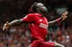 LIVERPOOL, ENGLAND - AUGUST 12: Sadio Mane of Liverpool celebrates after scoring a goal to make it 3-0 during the Premier League match between Liverpool FC and West Ham United at Anfield on August 12, 2018 in Liverpool, United Kingdom. (Photo by Robbie Ja