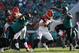 JACKSONVILLE, FL - NOVEMBER 05: Yannick Ngakoue #91 and Calais Campbell #93 of the Jacksonville Jaguars put pressure on Andy Dalton #14 of the Cincinnati Bengals in the second half of their game at EverBank Field on November 5, 2017 in Jacksonville, Flo