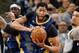 SAN ANTONIO,TX - FEBRUARY 28 : Anthony Davis #23 of the New Orleans Pelicans looks to make an outlet pass after grabbing a rebound between LaMarcus Aldridge #12 and Danny Green #14 of the San Antonio Spurs at AT&T Center on February 28, 2018 in San Anto