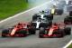 MONZA, ITALY - SEPTEMBER 02: Kimi Raikkonen of Finland driving the (7) Scuderia Ferrari SF71H and Sebastian Vettel of Germany driving the (5) Scuderia Ferrari SF71H race to the first corner ahead of Lewis Hamilton of Great Britain driving the (44) Merced