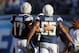 SAN DIEGO - OCTOBER 31: Quarterback Philip Rivers #17 and tight end Antonio Gates #85 of the San Diego Chargers walk up the sideline together against the Tennessee Titans in the fourth quarter at Qualcomm Stadium on October 31, 2010 in San Diego, Califor
