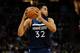 MINNEAPOLIS, MN - APRIL 23: Karl-Anthony Towns #32 of the Minnesota Timberwolves has the ball against the Houston Rockets in Game Four of Round One of the 2018 NBA Playoffs on April 23, 2018 at the Target Center in Minneapolis, Minnesota. The Rockets defe