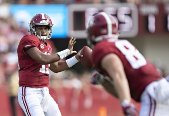 TUSCALOOSA, AL - SEPTEMBER 22:  Tea Tagovailoa #13 of the Alabama Crimson Tide throws a pass to Hale Hentges in the second quarter against the Texas A&M Aggies at Bryant-Denny Stadium on September 22, 2018 in Tuscaloosa, Alabama.  (Photo by Wesley Hitt/Ge