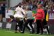 BURNLEY, ENGLAND - SEPTEMBER 02: Jose Mourinho, Manager of Manchester United holds Eric Bailly of Manchester United as he replaces Paul Pogba of Manchester United during the Premier League match between Burnley FC and Manchester United at Turf Moor on Se