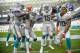 MIAMI, FL - SEPTEMBER 23: Senorise Perry #34, Jakeem Grant #19, Albert Wilson #15 and Kenny Stills #10 of the Miami Dolphins celebrate a touchdown against the Oakland Raiders at Hard Rock Stadium on September 23, 2018 in Miami, Florida. (Photo by Mark Bro