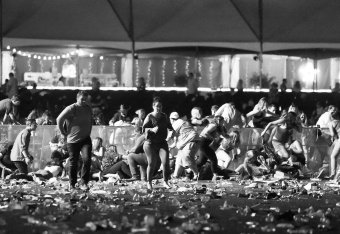 Concertgoers flee during the shooting.