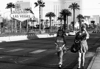 A pair of festivalgoers walk near the scene of the shooting in Las Vegas on October 2, 2017.