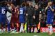 Liverpool's German manager Jurgen Klopp congratulates the Cheslea players following the English League Cup third round football match between Liverpool and Chelsea at Anfield in Liverpool, north west England on September 26, 2018. (Photo by Paul ELLIS / A