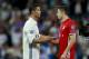 MADRID, SPAIN - APRIL 18: Cristiano Ronaldo (L) of Real Madrid CF clashes hands with Robert Lewandowski (R) of Bayern Muenchen after the UEFA Champions League Quarter Final second leg match between Real Madrid CF and FC Bayern Muenchen at Estadio Santiag