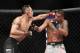 Tony Ferguson (L) won a spirited, bloody bout against former champion Anthony Pettis.
