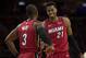 PHILADELPHIA, PA - APRIL 16: Dwyane Wade #3 of the Miami Heat talks with Hassan Whiteside #21 in the second quarter against the Philadelphia 76ers during Game Two of the first round of the 2018 NBA Playoff at Wells Fargo Center on April 16, 2018 in Philad