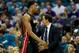 CHARLOTTE, NC - APRIL 25: Head coach Erik Spoelstra stands with his player Hassan Whiteside #21 of the Miami Heat against the Charlotte Hornets during game four of the Eastern Conference Quarterfinals of the 2016 NBA Playoffs at Time Warner Cable Arena o