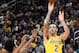 LAS VEGAS, NEVADA - OCTOBER 10: Lonzo Ball #2 of the Los Angeles Lakers shoots against Quinn Cook #4 of the Golden State Warriors during their preseason game at T-Mobile Arena on October 10, 2018 in Las Vegas, Nevada. The Lakers defeated the Warriors 123
