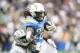 CARSON, CA - OCTOBER 07: Running back Melvin Gordon #28 of the Los Angeles Chargers is tackled by linebacker Tahir Whitehead #59 of the Oakland Raiders in the third quarter at StubHub Center on October 7, 2018 in Carson, California. (Photo by Harry How/Ge
