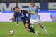 FERRARA, ITALY - OCTOBER 07: Ivan Perisic of FC Internazionale competes for the ball with Thiago Cionek (L) of Spal during the Serie A match between SPAL and FC Internazionale at Stadio Paolo Mazza on October 7, 2018 in Ferrara, Italy. (Photo by Alessand