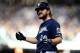 MILWAUKEE, WI - OCTOBER 13: Wade Miley #20 of the Milwaukee Brewers celebrates after hitting a single against Hyun-Jin Ryu #99 of the Los Angeles Dodgers during the fifth inning in Game Two of the National League Championship Series at Miller Park on Oct