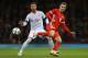Spain's defender Sergio Ramos (L) vies with Wales' midfielder Aaron Ramsey during the international friendly football match between Wales and Spain at The Principality Stadium in Cardiff, south Wales, on October 11, 2018. (Photo by GEOFF CADDICK / AFP)