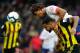 Bournemouth's Dutch defender Nathan Ake (top) vies to header the ball with Watford's English striker Andre Gray during the English Premier League football match between Watford and Bournemouth at Vicarage Road Stadium in Watford, north of London on Octobe