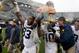 The Wolverines with the Paul Bunyan Trophy