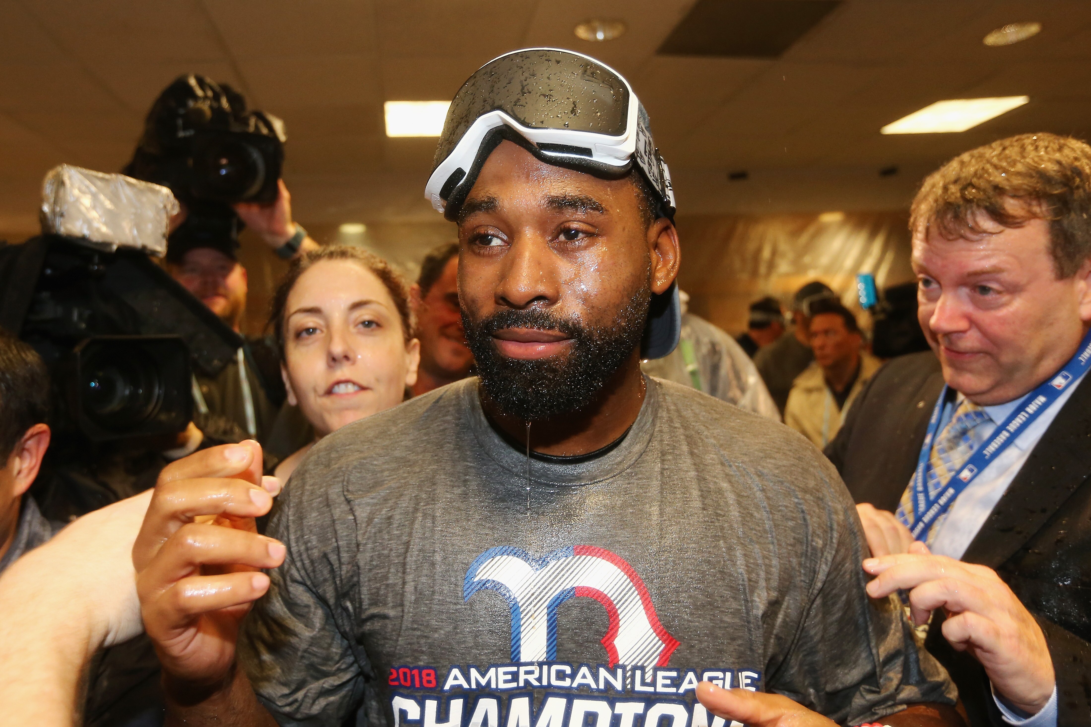 HOUSTON, TX - OCTOBER 18:  Jackie Bradley Jr. #19 of the Boston Red Sox celebrates in the clubhouse after defeating the Houston Astros 4-1 in Game Five of the American League Championship Series to advance to the 2018 World Series at Minute Maid Park on O