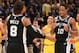 LOS ANGELES, CA - OCTOBER 22: Patty Mills #8 DeMar DeRozan #10 and Bryn Forbes #11 of the San Antonio Spurs react during the gamge against the Los Angeles Lakers on October 22, 2018 at STAPLES Center in Los Angeles, California. NOTE TO USER: User express