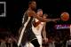 NEW YORK, NY - FEBRUARY 26: Kevin Durant #35 of the Golden State Warriors passes the ball as Michael Beasley #8 of the New York Knicks defends at Madison Square Garden on February 26,2018 in New York City. NOTE TO USER: User expressly acknowledges and ag