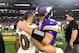 MINNEAPOLIS, MN - OCTOBER 28: Kirk Cousins #8 of the Minnesota Vikings and Austin Carr #80 of the New Orleans Saints embrace after the game at U.S. Bank Stadium on October 28, 2018 in Minneapolis, Minnesota. The Saints defeated the Vikings 30-20 (Photo by