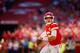 KANSAS CITY, MO - OCTOBER 28: Patrick Mahomes #15, quarterback with the Kansas City Chiefs, rolled out before throwing a pass against the Denver Broncos at Arrowhead Stadium on October 28, 2018 in Kansas City, Missouri. (Photo by David Eulitt/Getty Images