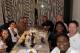 Xander Bogaerts (back left) sits with friends and family, including brother Jair and father Maarten (back right), mother Sandra Brown (front right) and sister Chandra (front left).