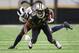 NEW ORLEANS, LA - NOVEMBER 04: Marcus Peters #22 of the Los Angeles Rams tackles Michael Thomas #13 of the New Orleans Saints during the third quarter of the game at Mercedes-Benz Superdome on November 4, 2018 in New Orleans, Louisiana. (Photo by Gregor