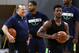 Head coach Tom Thibodeau (left) and Jimmy Butler (with basketball).
