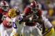 BATON ROUGE, LA - NOVEMBER 03: Najee Harris #22 of the Alabama Crimson Tide battles for yards while being tackled by Devin White #40 of the LSU Tigers during a second half run at Tiger Stadium on November 3, 2018 in Baton Rouge, Louisiana. Alabama won th