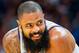 DENVER, CO - OCTOBER 20: Tyson Chandler #4 of the Phoenix Suns laughs at comment by a fan (not pictured) during the first half against the Denver Nuggets at Pepsi Center on October 20, 2018 in Denver, Colorado. NOTE TO USER: User expressly acknowledges an