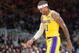 SAN JOSE, CA - OCTOBER 12: Michael Beasley #11 of the Los Angeles Lakers walks off the court smiling after he received two technical fouls and was ejected from the game against the Golden State Warriors during the second half of their NBA basketball game