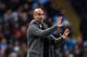 MANCHESTER, ENGLAND - NOVEMBER 07: Josep Guardiola, Manager of Manchester City gives his team instructions during the Group F match of the UEFA Champions League between Manchester City and FC Shakhtar Donetsk at Etihad Stadium on November 7, 2018 in Manc