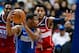 Dennis Smith Jr. (with ball) and Otto Porter Jr.