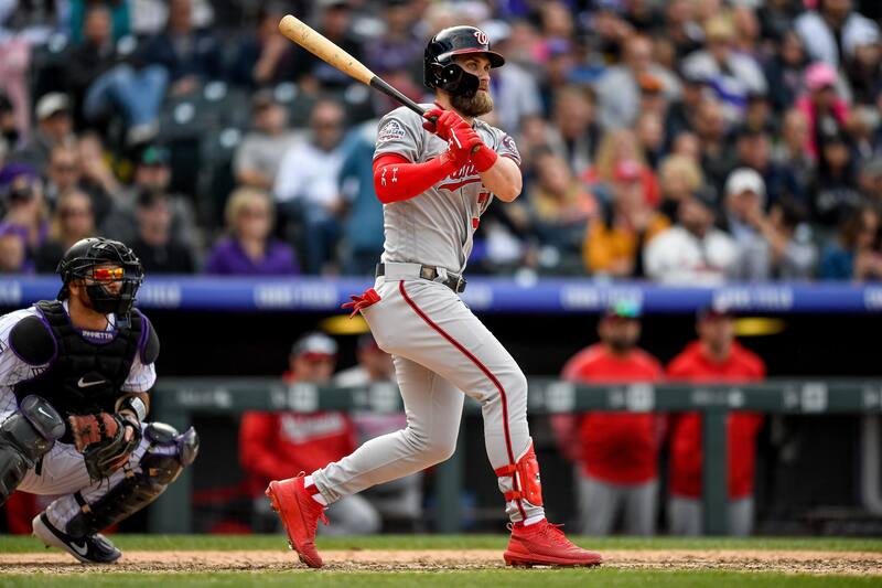 DENVER, CO - SEPTEMBER 30: Bryce Harper #34 of the Washington Nationals hits a ninth inning double against the Colorado Rockies at Coors Field on September 30, 2018 in Denver, Colorado. (Photo by Dustin Bradford/Getty Images)