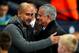 MANCHESTER, ENGLAND - NOVEMBER 11: Pep Guardiola the head coach / manager of Manchester City and Jose Mourinho the head coach / manager of Manchester United during the Premier League match between Manchester City and Manchester United at Etihad Stadium o