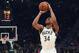 MILWAUKEE, WISCONSIN - NOVEMBER 14: Giannis Antetokounmpo #34 of the Milwaukee Bucks takes a three point shot during the first half of a game against the Memphis Grizzlies at Fiserv Forum on November 14, 2018 in Milwaukee, Wisconsin. NOTE TO USER: User