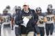 WEST LAFAYETTE, IN - NOVEMBER 04: Head coach Jeff Brohm of the Purdue Boilermakers runs out with the team before the game against the Illinois Fighting Illini at Ross-Ade Stadium on November 4, 2017 in West Lafayette, Indiana. (Photo by Michael Hickey / Ge