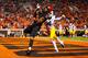 STILLWATER, OK - NOVEMBER 17: Wide receiver Tyron Johnson #13 of the Oklahoma State Cowboys pulls down a touchdown catch against cornerback Josh Norwood #4 of the West Virginia Mountaineers in the fourth quarter on November 17, 2018 at Boone Pickens Stad