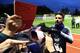 France's forward Olivier Giroud (R) signs autographs before a training session in Clairefontaine-en-Yvelines on November 12, 2018, as part of the team's preparation for the upcoming Nations League football match against the Netherlands and a friendly foot